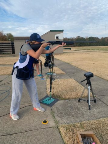 Freshman Emery Taylor (9) stands on the line. Freshmen spends Monday afternoon and Saturday mornings learning how to hold a gun and shoot. 