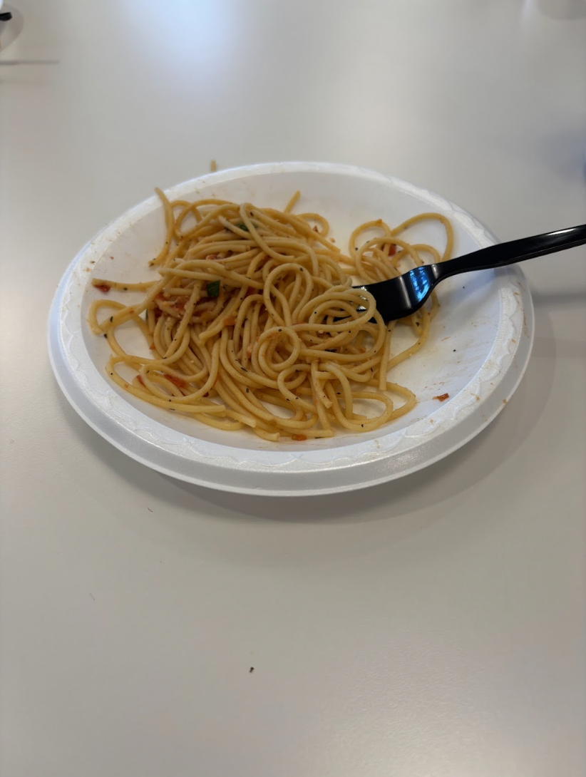 Plate of leftover pasta in the St. Mary's dining hall that is about to be thrown away. 