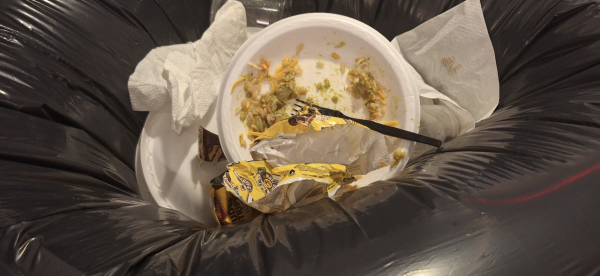 Plates of food and other trash were thrown away after Upper School lunch. 