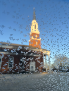 An icy windshield obscures the view of Holy Communion from the St. Mary's parking lot. 