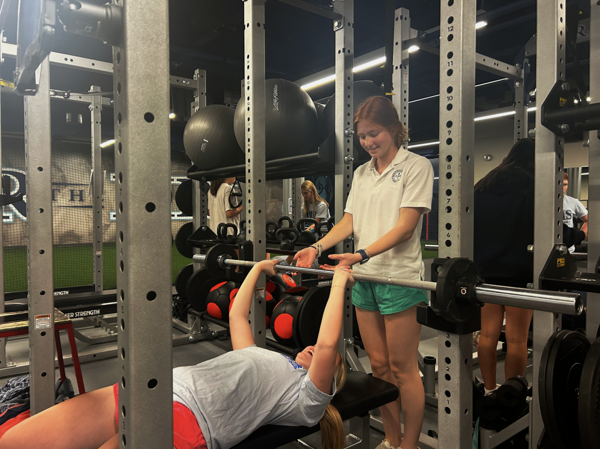 Students work out in the St. Mary's Strength and Conditioning room. These workouts are required for most St. Mary's athletes.
